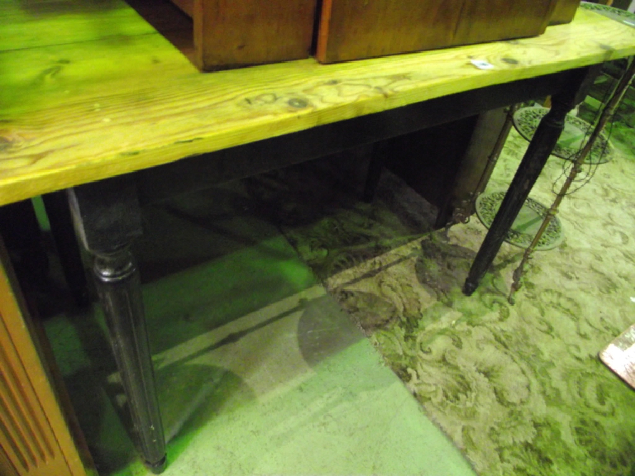 Appraisal: A pine side table with plank top on fluted supports