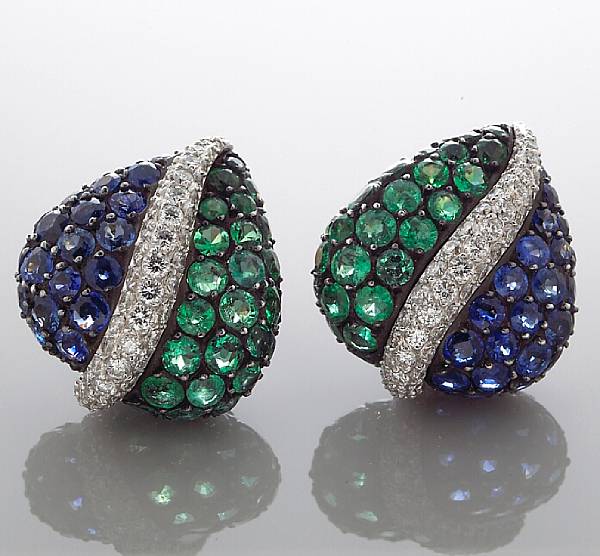 Appraisal: A pair of sapphire emerald and diamond earclips Gioia each