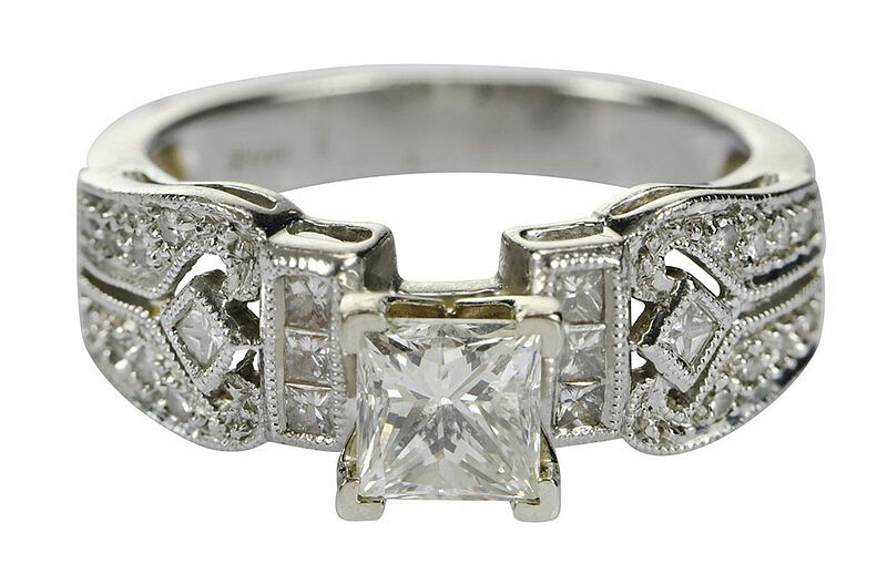 Appraisal: Platinum and Gold Diamond Ring center princess cut diamond estimated