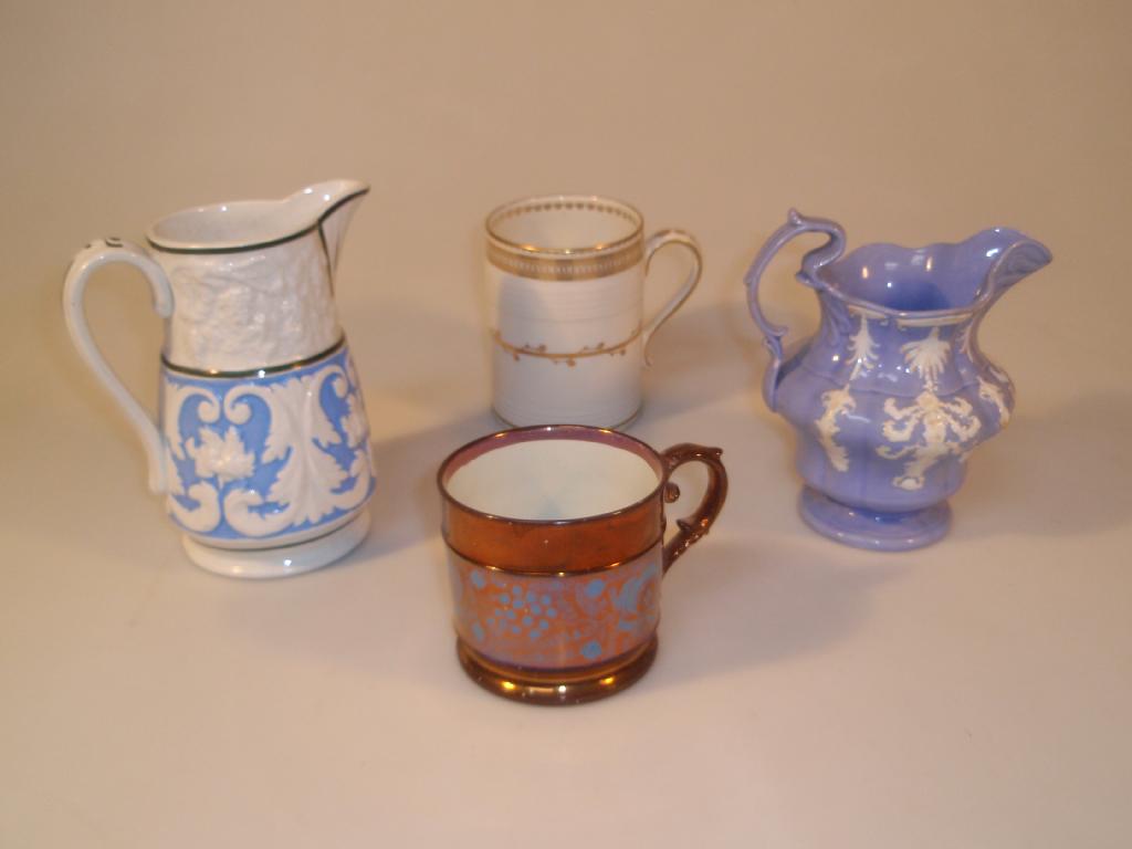 Appraisal: A Derby porcelain mug with a scroll handle the straight