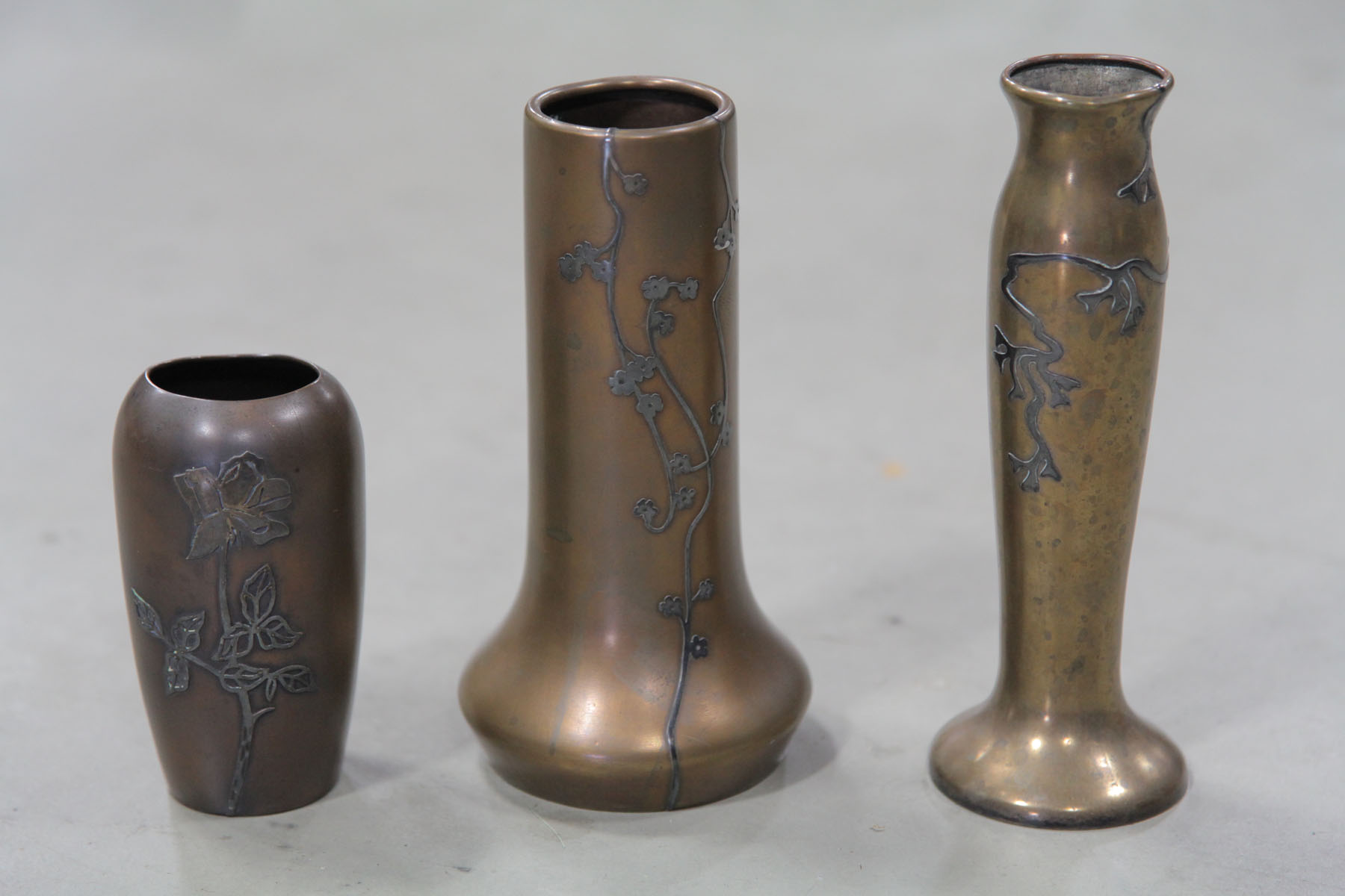 Appraisal: THREE HEINTZ VASES New York early th century sterling on