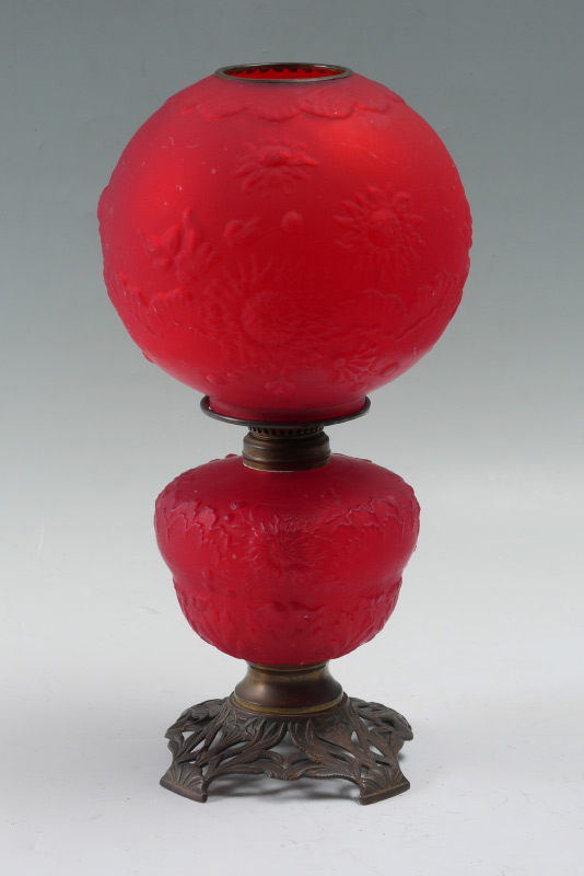 Appraisal: RED SATIN GLASS SUNFLOWER OIL LAMP Embossed red satin glass