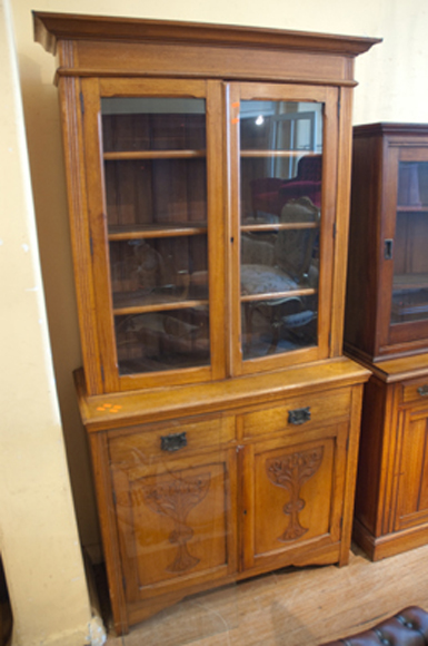 Appraisal: EDWARDIAN TWO DOOR GLAZED BOOKCASE