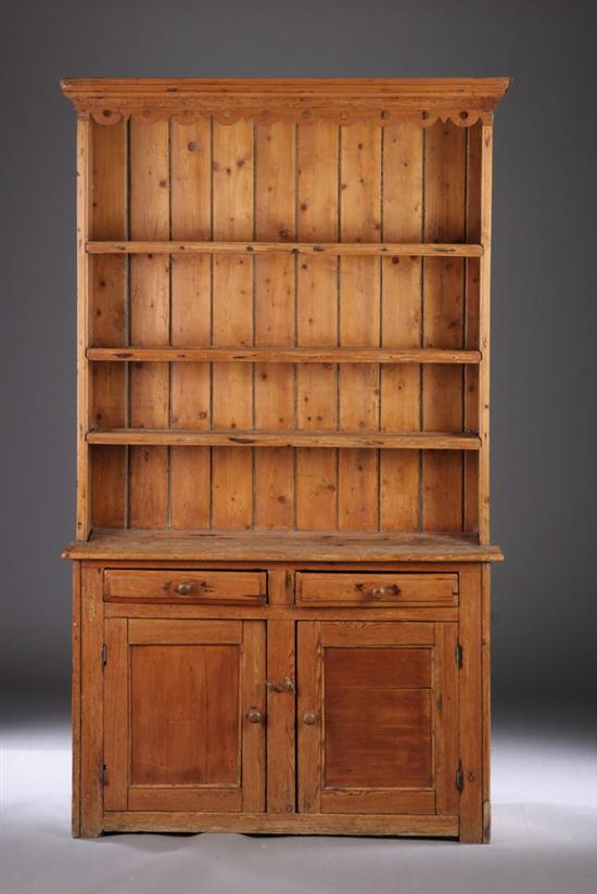 Appraisal: ENGLISH PINE STEPPED-BACK CUPBOARD Mid-to-late th century Pierced and scalloped