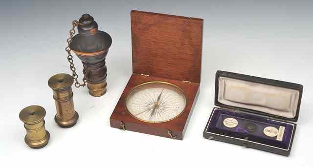 Appraisal: A MAHOGANY CASED COMPASS with hinged lid two microscope lenses