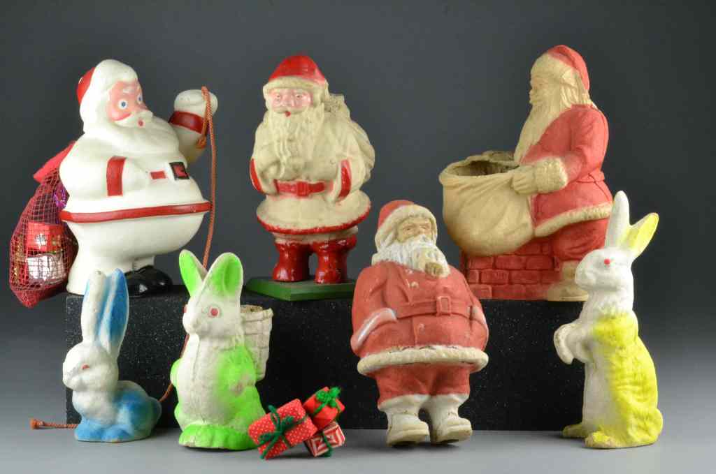 Appraisal: Paper Mache Santas and Easter BunniesFour different Santas and three