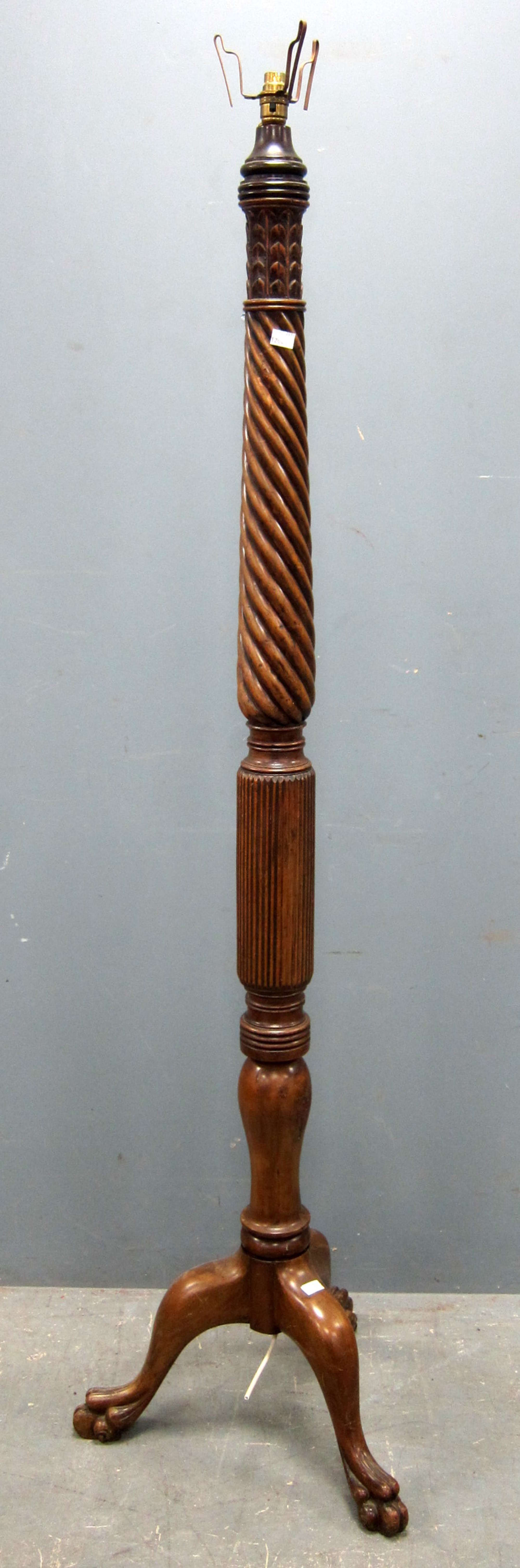 Appraisal: Mahogany barley twist standard lamp to tripod legs cm high