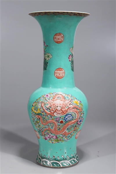 Appraisal: Chinese turquoise glazed famille rose enameled porcelain vase with flowers