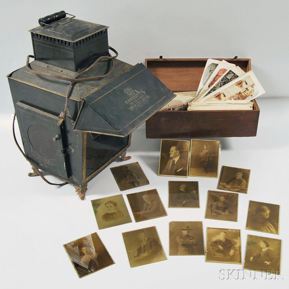 Appraisal: Magic Lantern Glass Slides and Stereoscope Cards a painted sheet