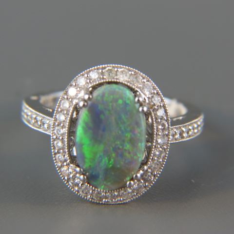 Appraisal: Opal Diamond Ring fiery grey black opal weighing carats surrounded