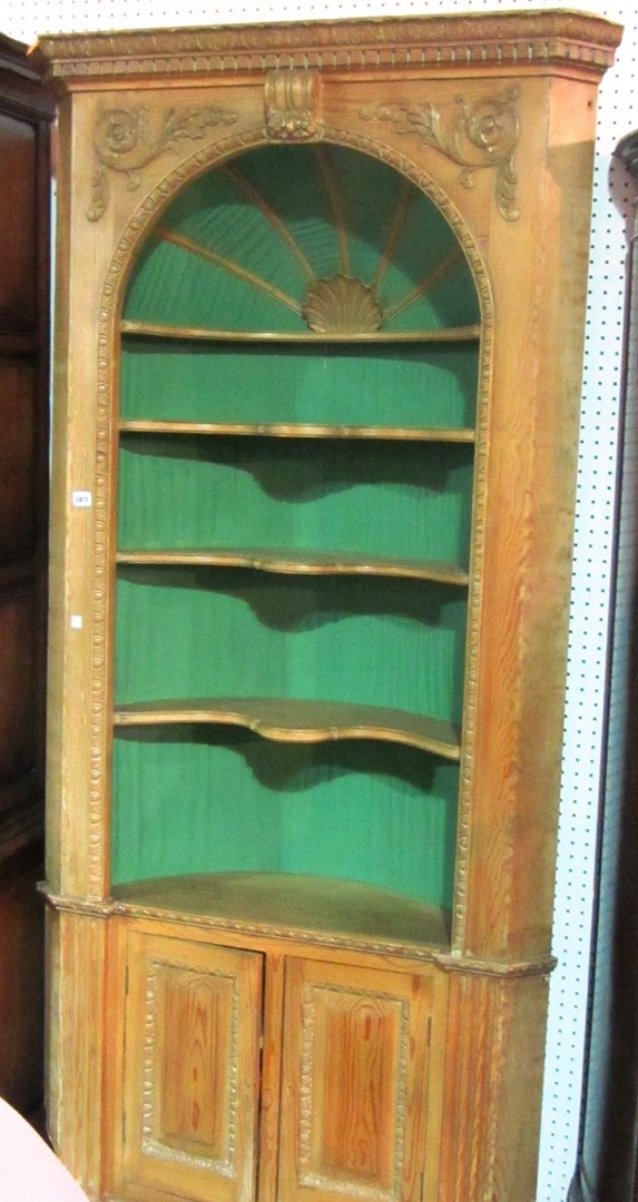 Appraisal: A pine barrel back corner cabinet