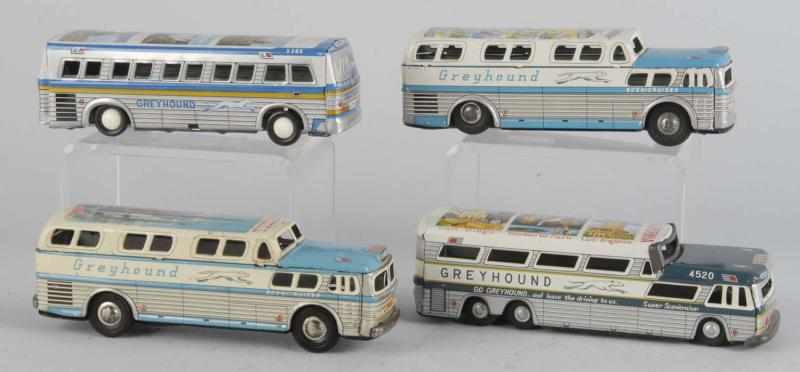 Appraisal: Lot of Tin Greyhound Bus Friction Toys Description Japanese Working