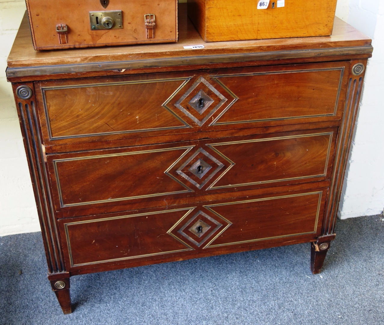 Appraisal: An early th century North European brass mounted mahogany three