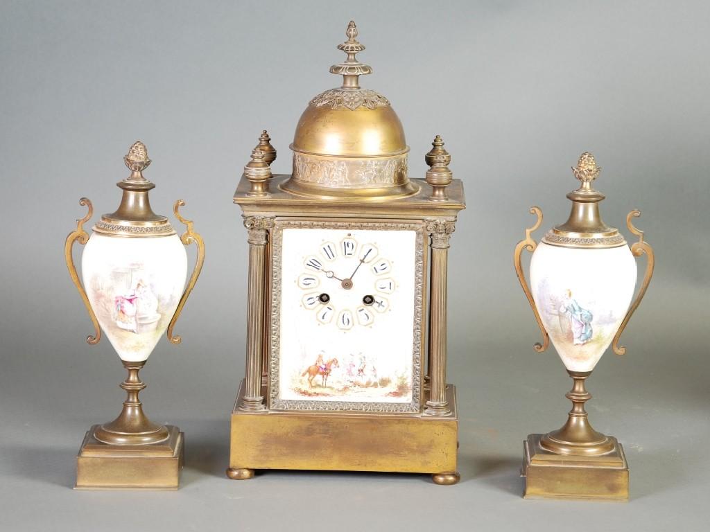 Appraisal: EARLY TWENTIETH CENTURY GILT METAL AND PORCELAIN THREE PIECE CLOCK