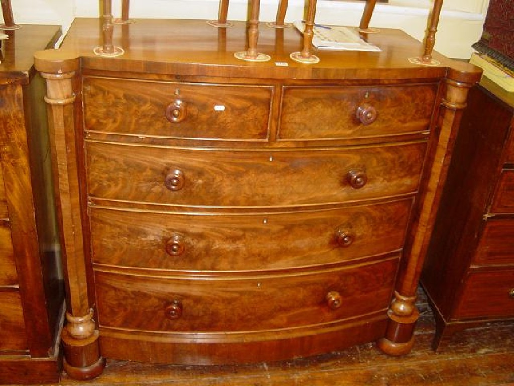 Appraisal: A Victorian mahogany bow fronted chest fitted with long and