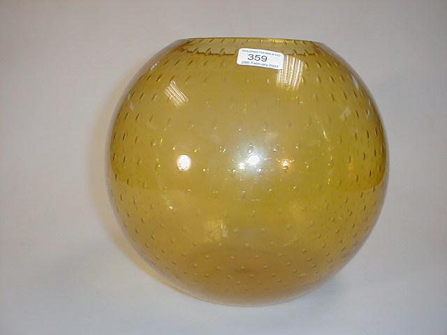 Appraisal: A large amber bubble glass spherical bowl dia