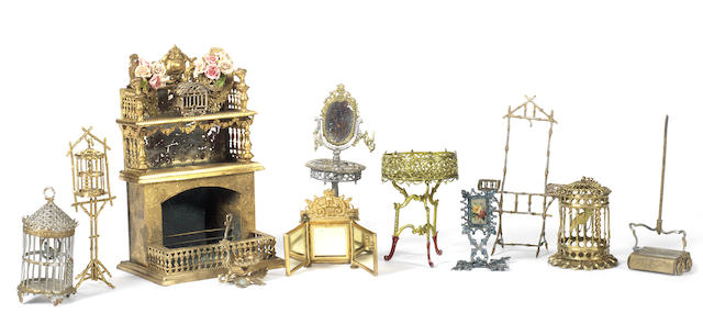 Appraisal: Miniature gilt bird cages fire-place and accessories Including two hanging