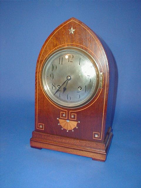 Appraisal: A thC mahogany lancet cased mantel clock of eight day