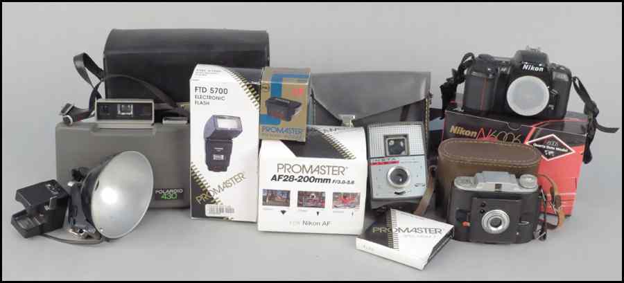 Appraisal: POLAROID CAMERA Together with a Nikon N camera a Promaster