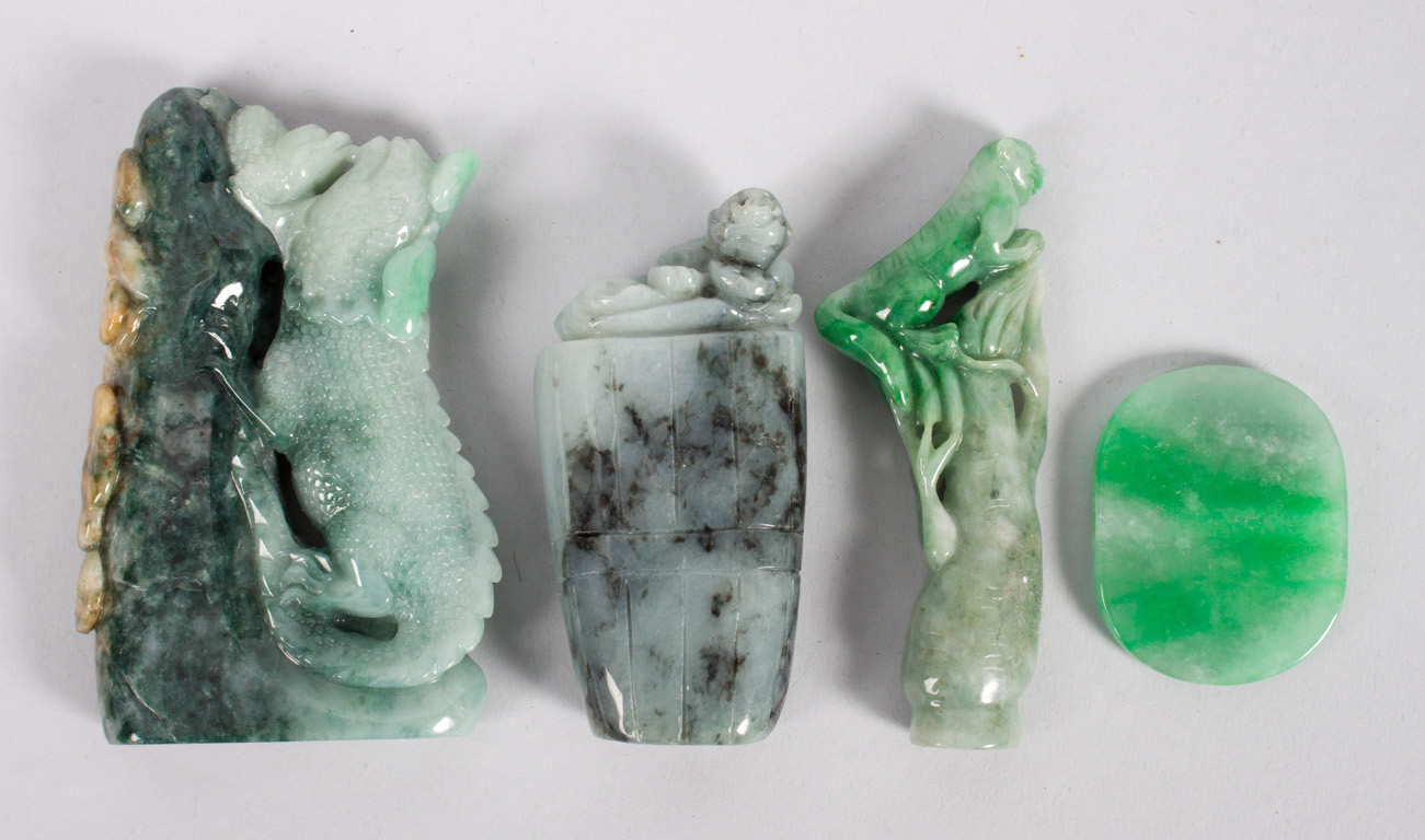 Appraisal: Chinese jade or hardstone chops a bead two carved dragon-form