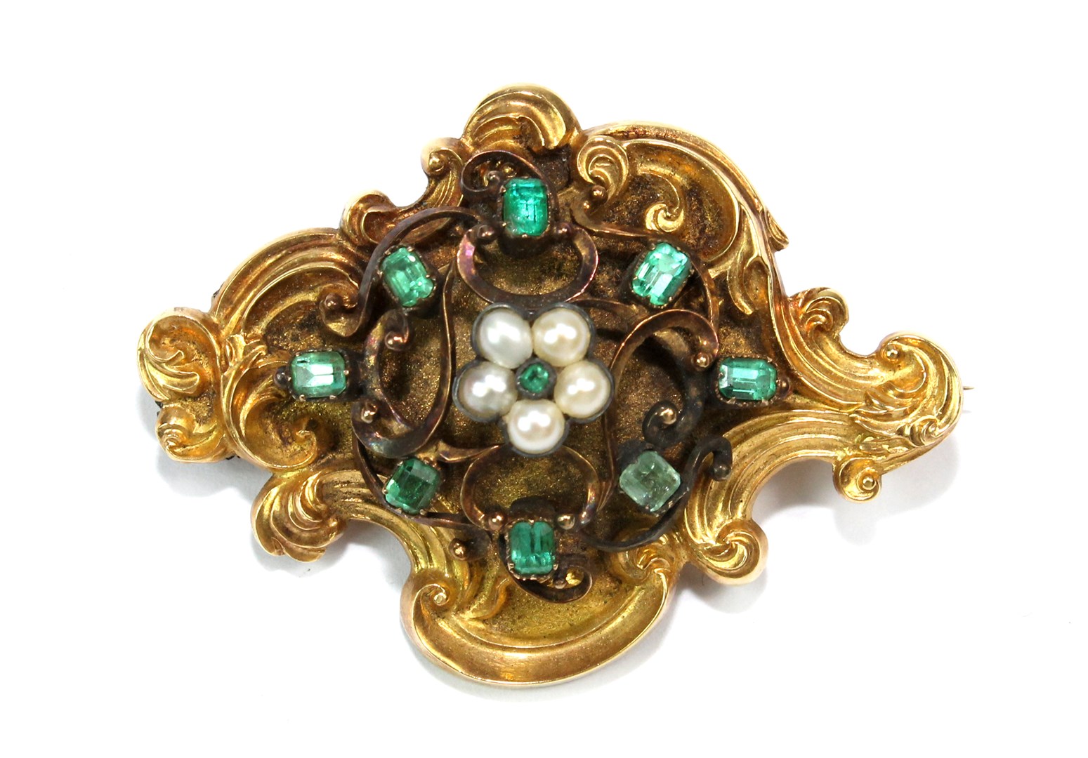 Appraisal: A Victorian gold emerald and half pearl set brooch in