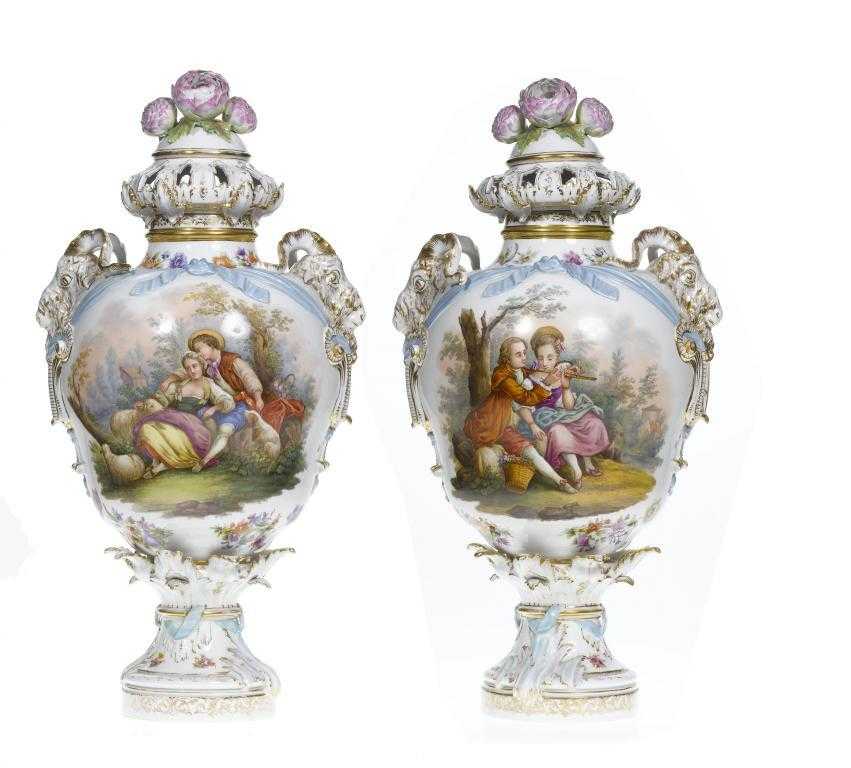 Appraisal: A PAIR OF BERLIN VASES AND COVERS of ogee form