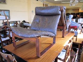 Appraisal: PAIR OF BROWN LEATHER UPHOLSTERED TESSA T ARMCHAIRS