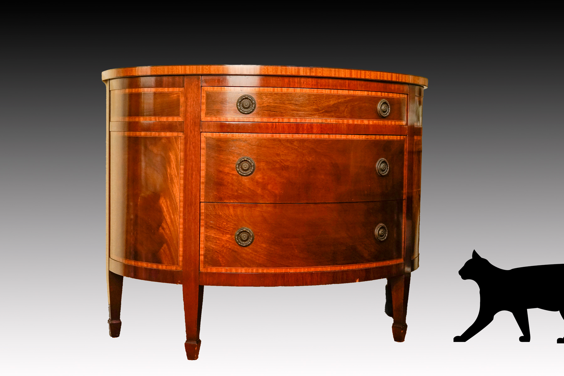 Appraisal: BANDED MAHOGANY DRAWER DEMILUNE Contemporary banded demilune with three drawers