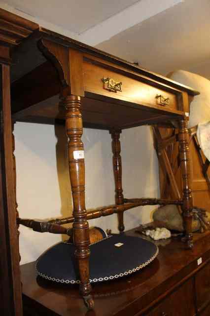 Appraisal: A VICTORIAN WALNUT WRITING TABLE fitted with single frieze drawer