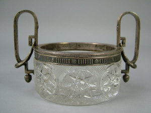 Appraisal: Karl Faberge a circular cut glass and silver mounted twin