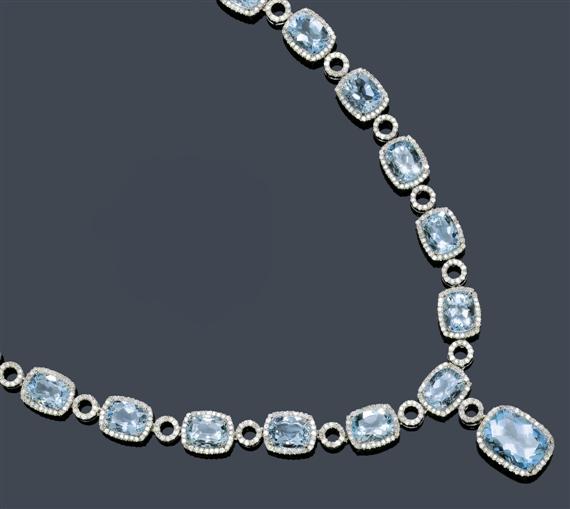 Appraisal: AN AQUAMARINE AND DIAMOND NECKLACE White gold Classic Y necklace