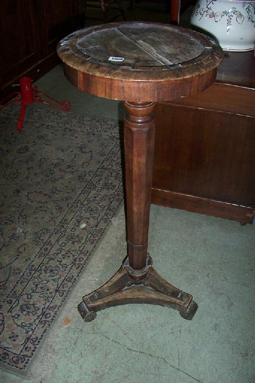 Appraisal: A Regency rosewood torchere inverted octagonal tapering column and tricorn