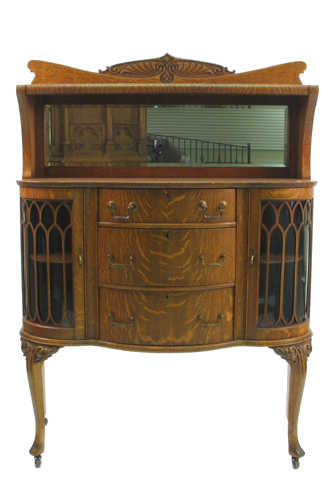 Appraisal: VICTORIAN OAK CHINA BUFFET American c having a horizontal mirror