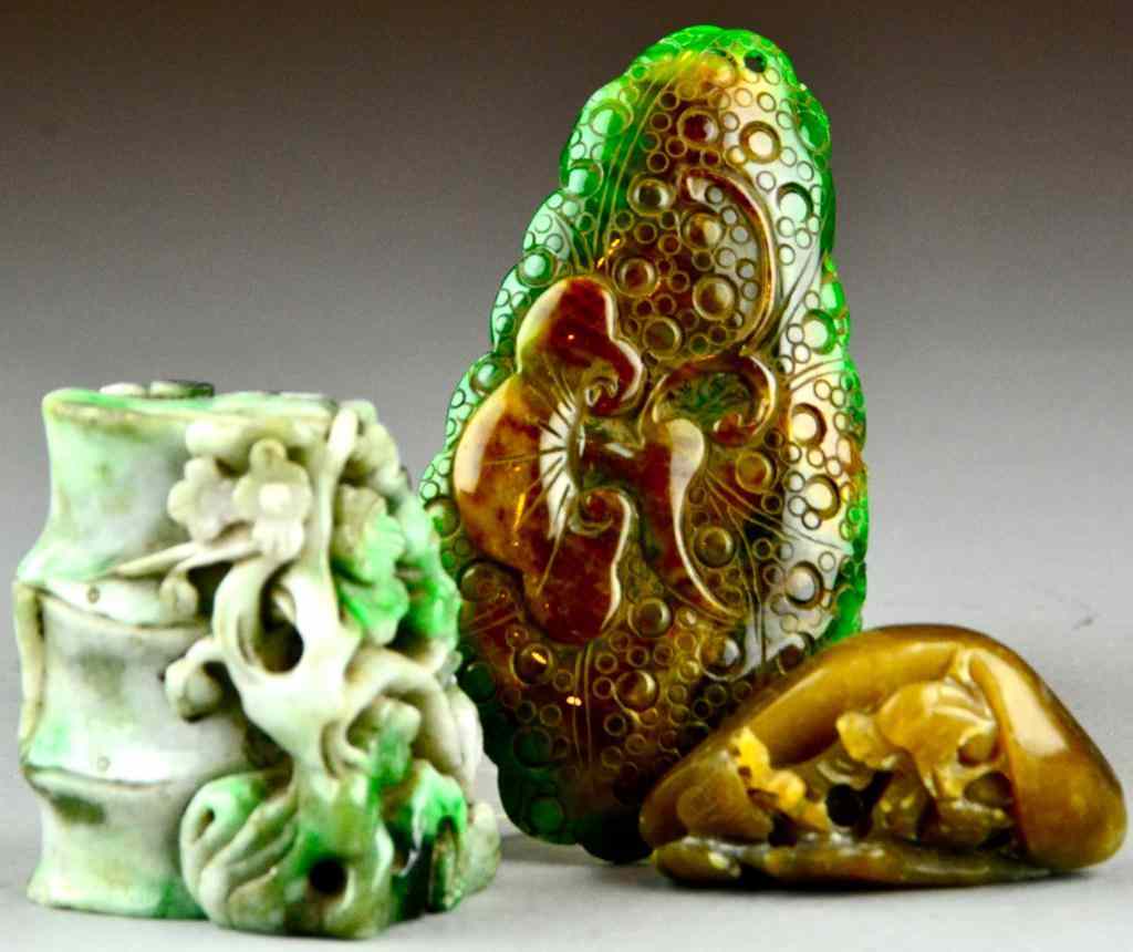 Appraisal: Chinese Carved Jade ItemsTo include a brown jade carving a