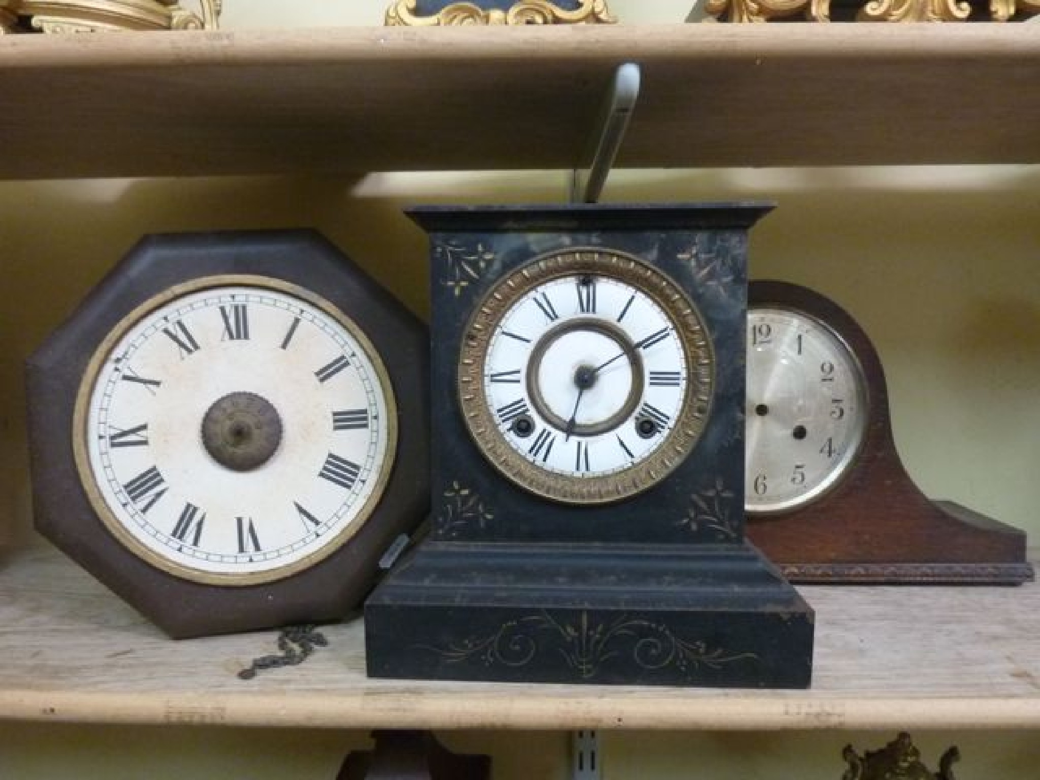 Appraisal: A Victorian cast iron mantle clock a Napoleon top hat