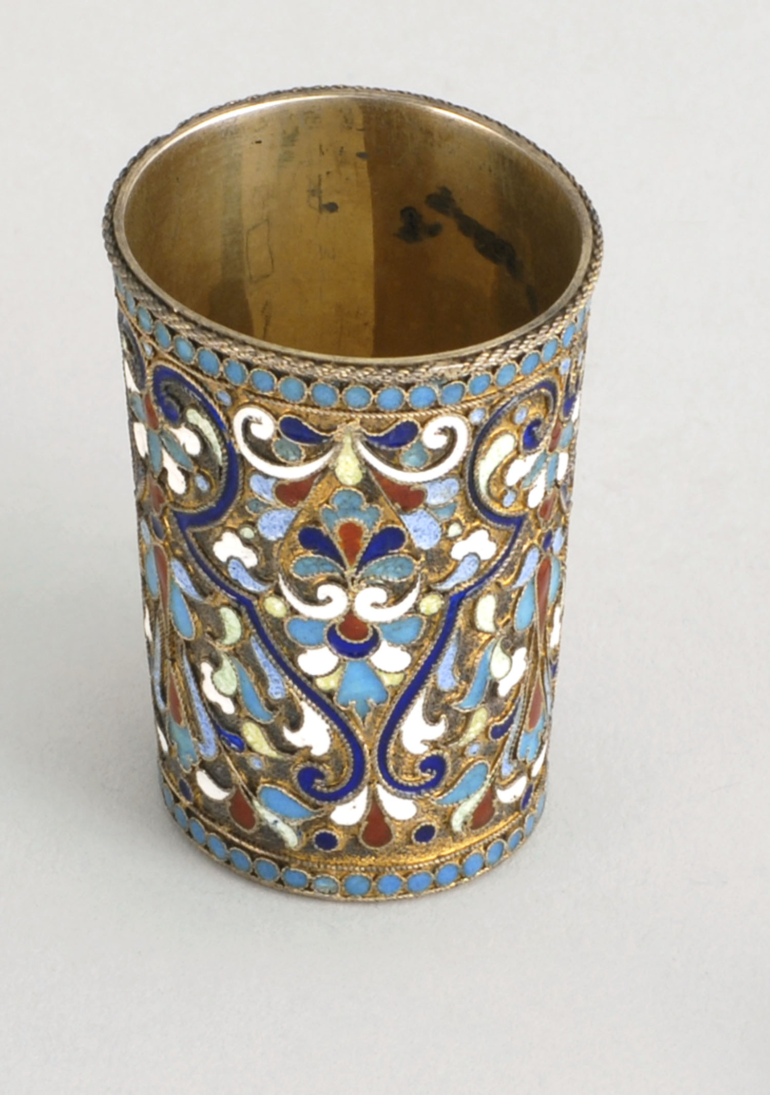 Appraisal: RUSSIAN SILVER GILT AND ENAMEL-DECORATED SHOT GLASS Late th CenturyMulticolored