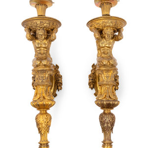 Appraisal: A Pair of Continental Gilt Bronze Figural Single-Light Figural Sconces