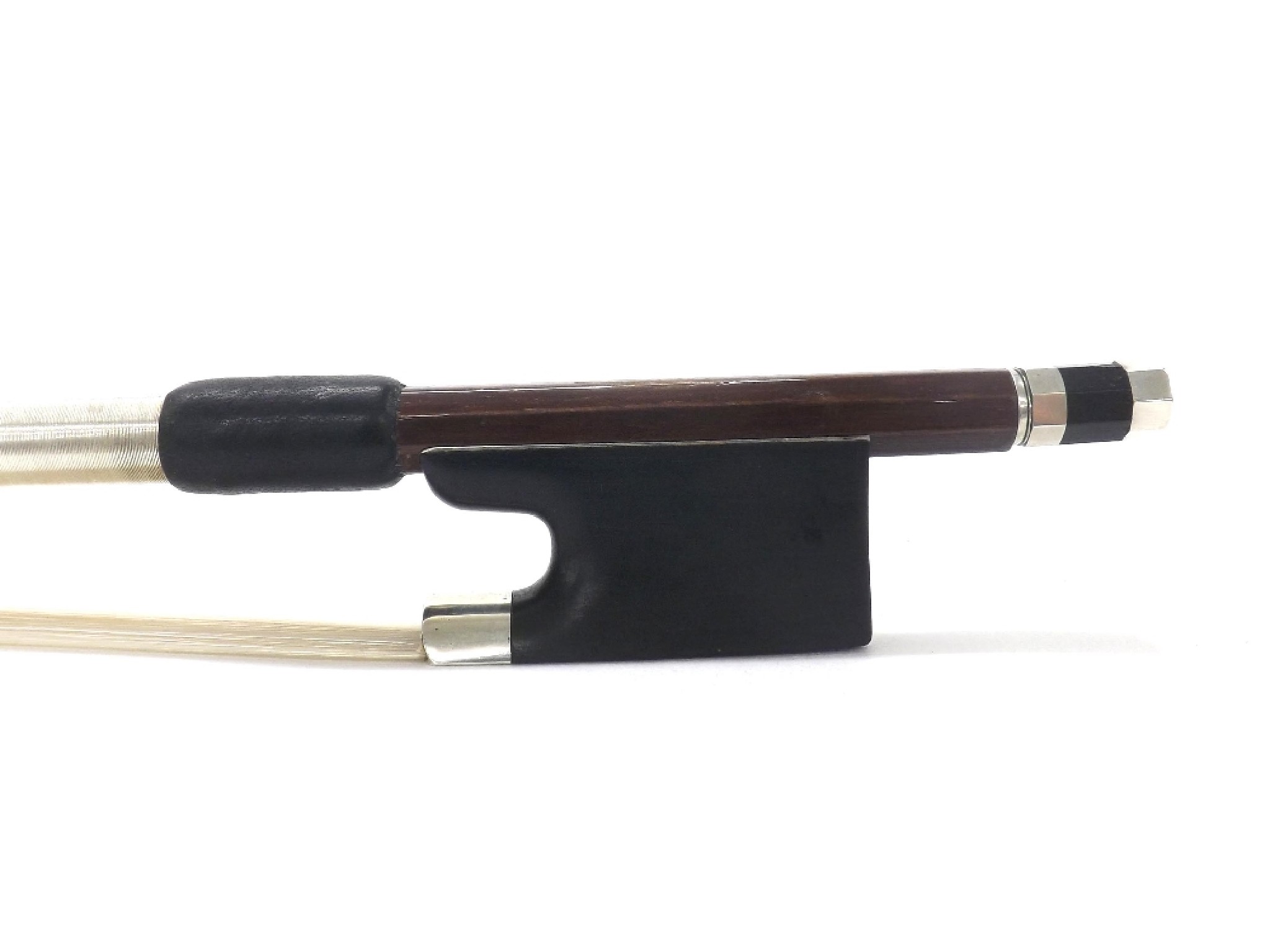 Appraisal: Silver mounted violin bow unstamped the stick round the ebony