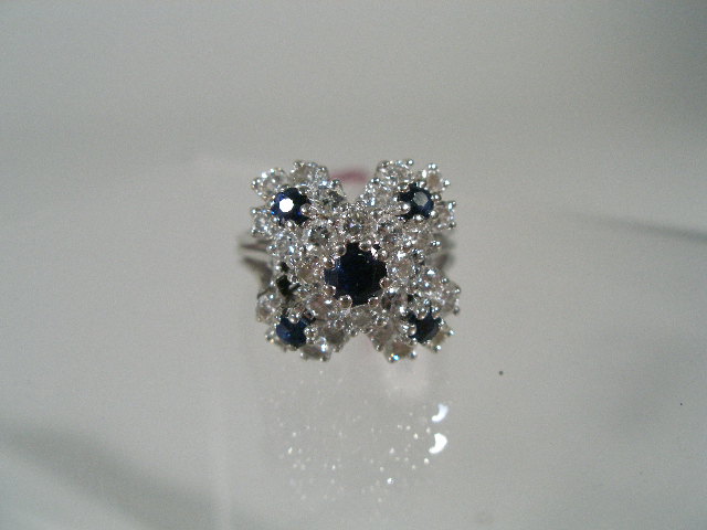 Appraisal: Ladies Cluster Dinner Ring K white gold diamonds and sapphire