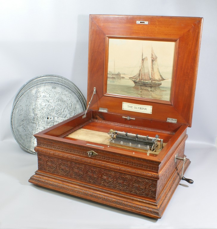 Appraisal: Olympia Double Comb Disc Music Box in a Carved Mahogany