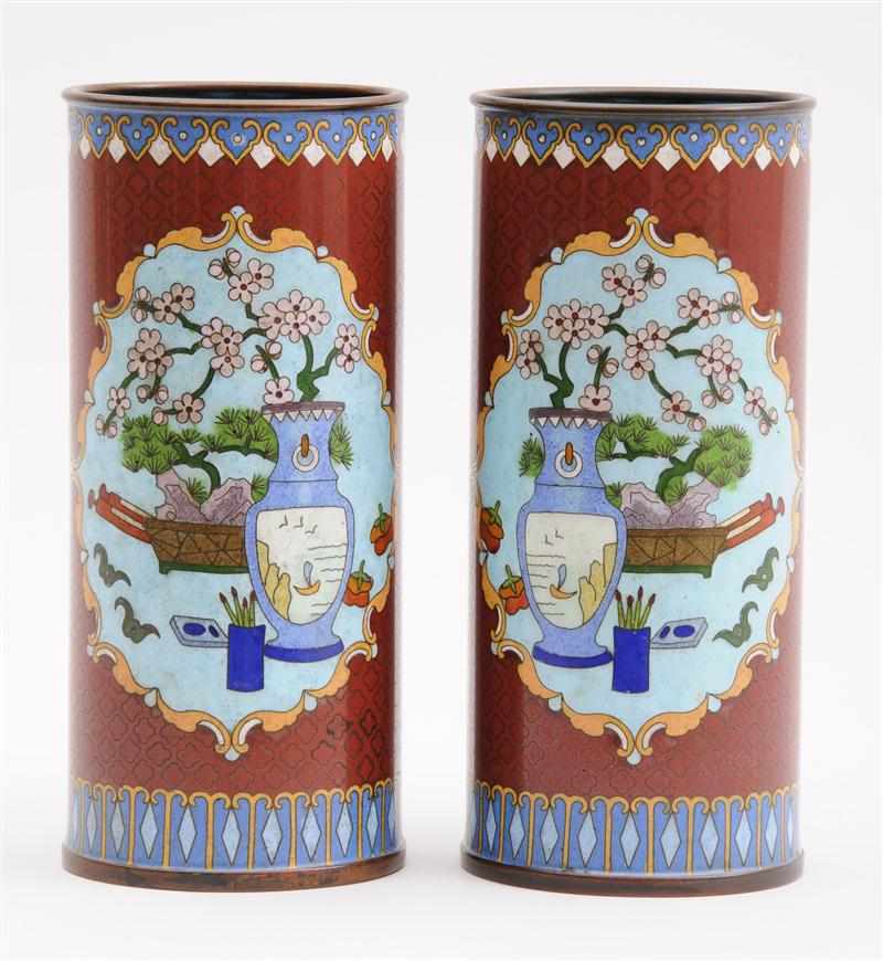 Appraisal: PAIR OF CHINESE IRON-RED GROUND CLOISONN ENAMEL CYLINDRICAL VASES Each