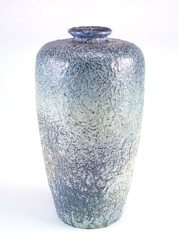 Appraisal: TIFFANY Tall textured vase with a blue green and grey