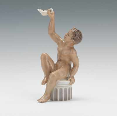 Appraisal: A Royal Copenhagen Satyr with Aladdin's Lamp Figurine Figure seated