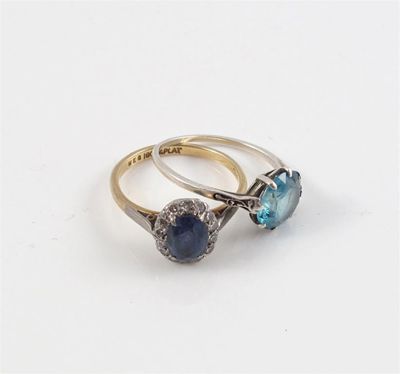 Appraisal: A sapphire and diamond cluster ring set in gold and