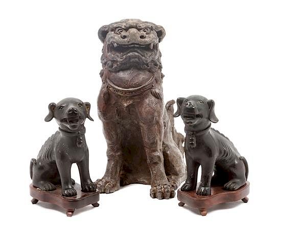 Appraisal: A Group of Three Chinese Foo Dogs Height of tallest