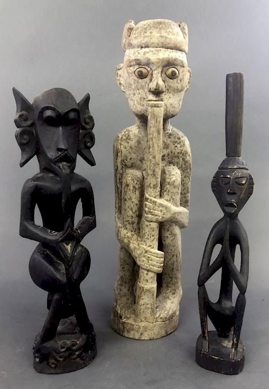 Appraisal: Three Primitive Art Wood Carved Figures Three primitive art wood