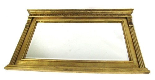 Appraisal: A thC gilt framed overmantel mirror the moulded top with