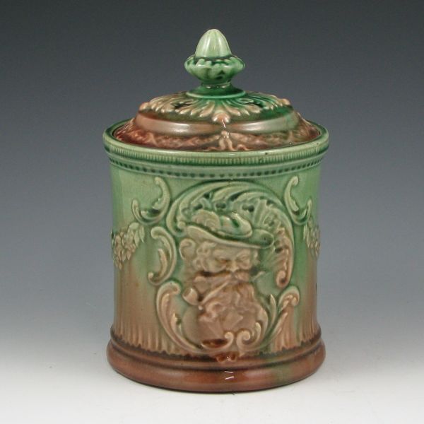 Appraisal: Roseville Majolica lidded tobacco jar with molded whimsical portraits of