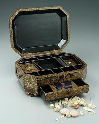 Appraisal: Chinese export lacquer sewing box octagonal with winged paw feet