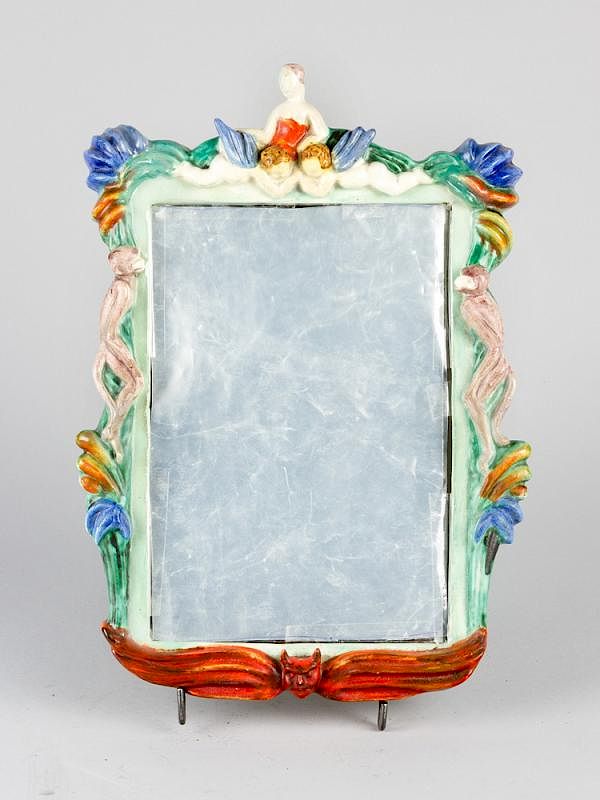 Appraisal: A Jugendstil ceramic mirror A Jugendstil ceramic mirror with sculpted